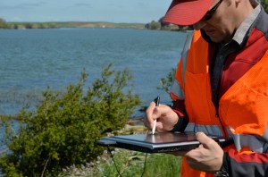US Army Corp of Engineers inspect a Sacramento river levee ( U.S. Army photo by Chris Gray-Garcia, Flickr).