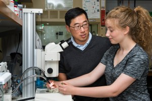 Photo of Seung Kim and former student Emma Herold (Steve Fisch)